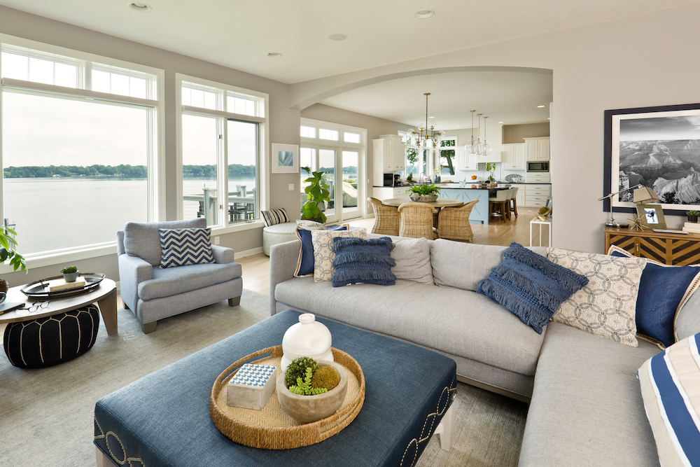 Contemporary Living Room Open plan showing kitchen light grey and blue with view of the lake
