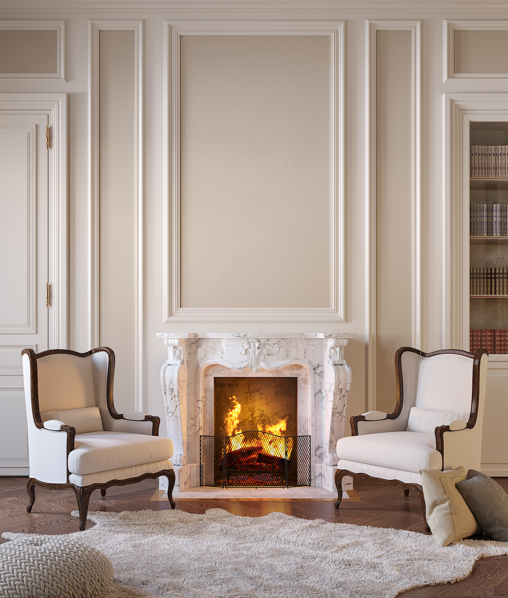 Traditional Living Room Design Classic beige interior with fireplace, armchairs, moldings, wall panel, carpet, fur.