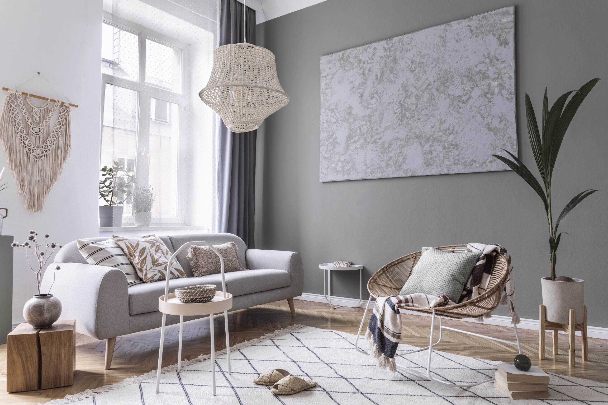 Eclectic Interior Design with grey walls and grey sofa with wood accents