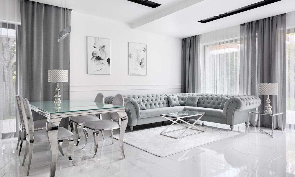 Hollywood Regency Design Style Living Room with grey, white and chrome