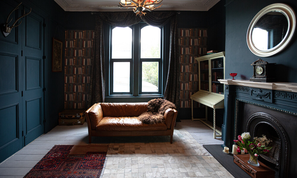 Drawing room with high ceilings and architectural features