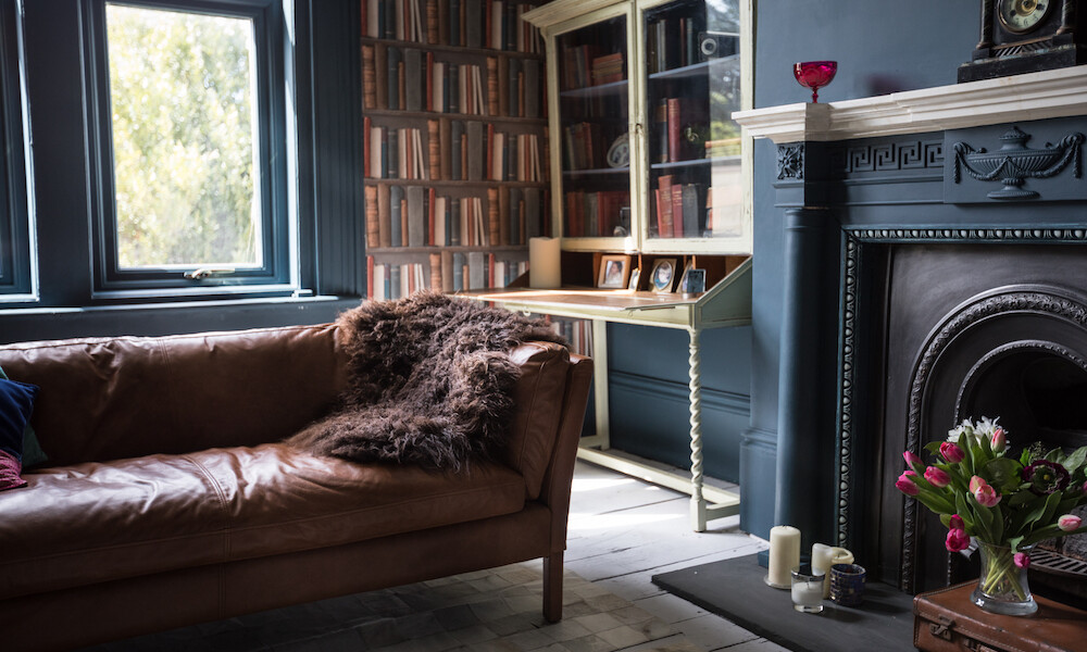 Living room with high ceilings and architectural features